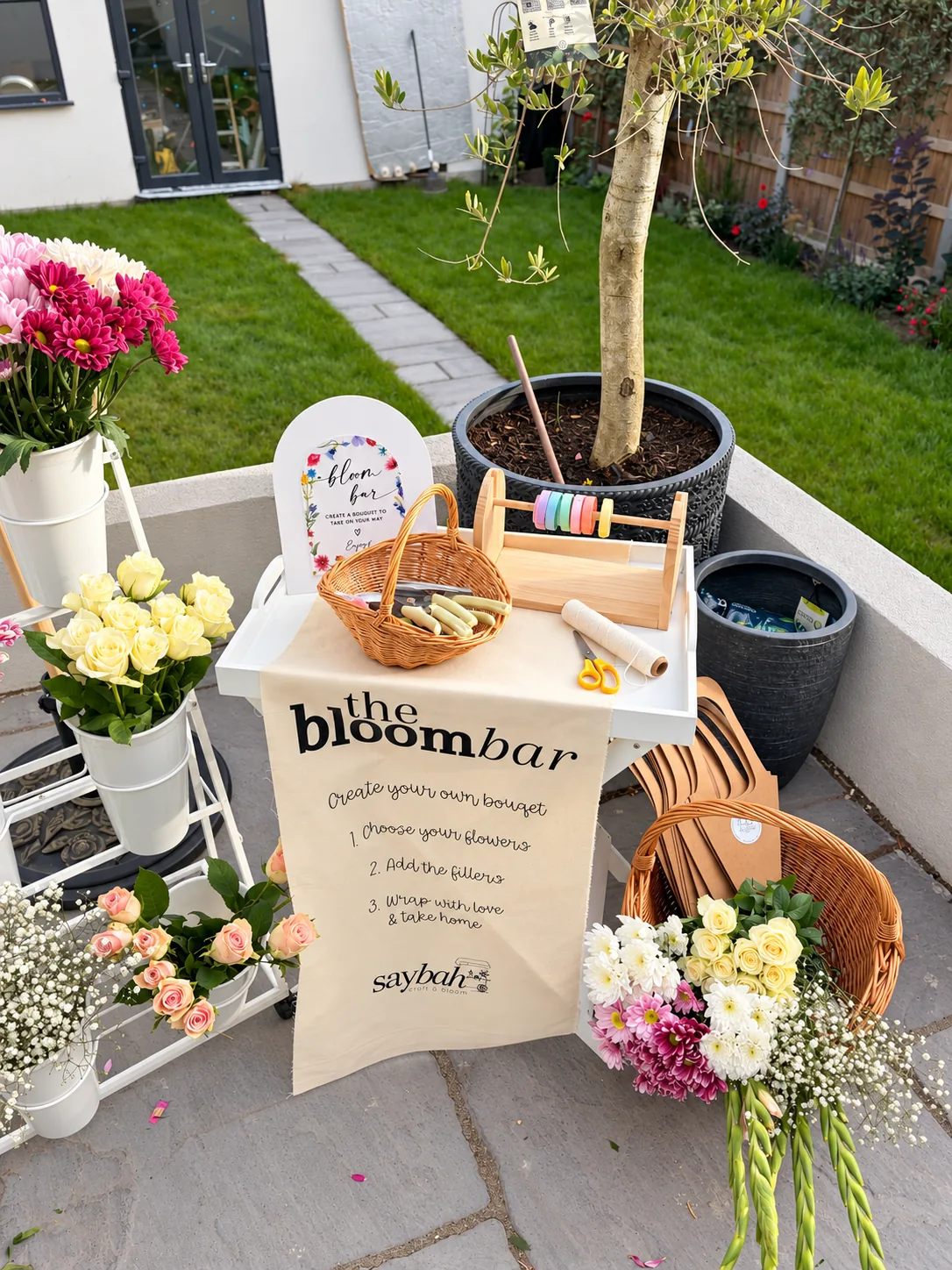 Flowers, bouquet wrapping and ribbon at a Saybah celebration